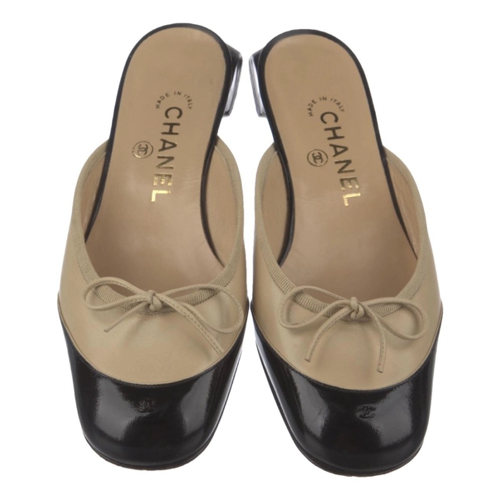 Chanel Black and Cream Mules Elegant Design